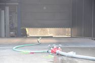 Brand met veel rook in bedrijfshal in Kapelstraat