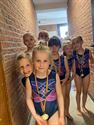 Jonge gymnasten streden voor clubmedailles