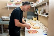 SFC-leerlingen leren pizza's bakken