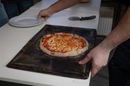 SFC-leerlingen leren pizza's bakken