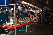 Sfeer ondanks de regen op Heusdense kerstmarkt