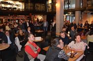 Vier handelskernen heffen samen het glas
