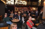 Vier handelskernen heffen samen het glas